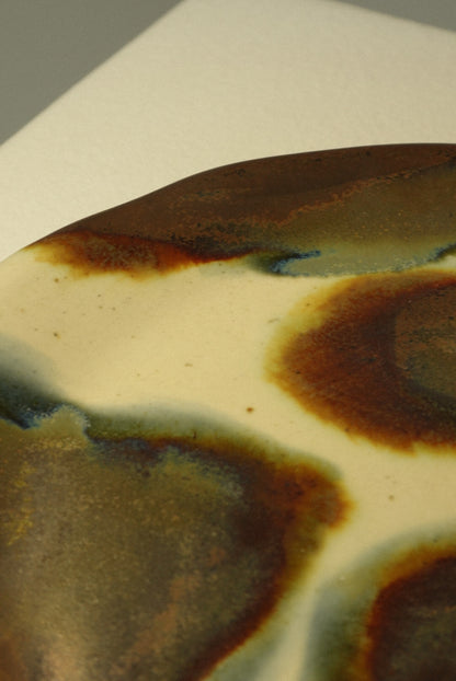 The Saucer in Off-Tone